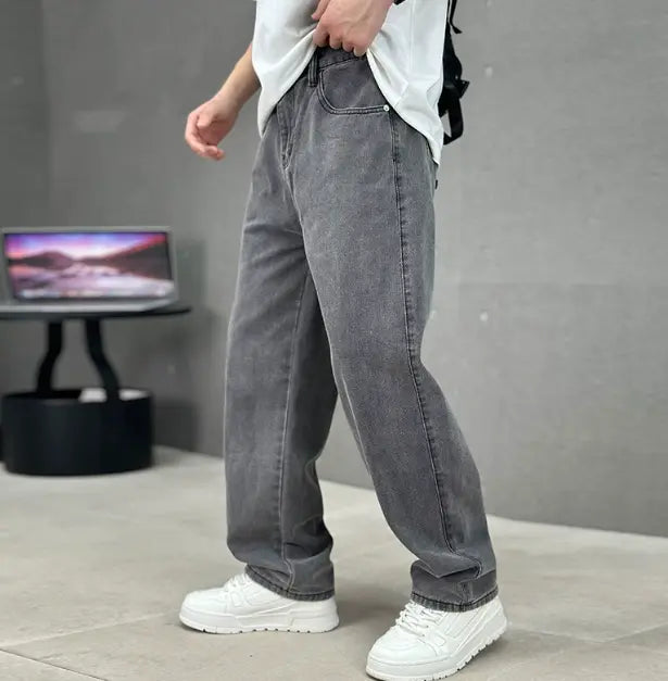 Men's stylish straight leg jeans, modern fit dark wash denim for comfortable and versatile everyday wear.