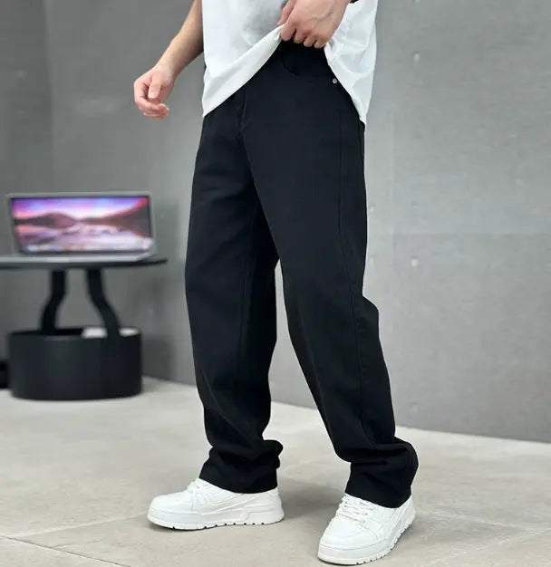 Versatile men's straight leg jeans in premium denim. Modern fit bottoms for a stylish, comfortable casual look.