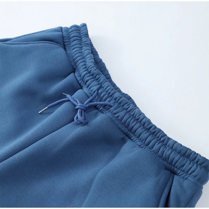 Men's stylish activewear tracksuit with modern fit joggers & hoodie, perfect for comfort and streetwear.