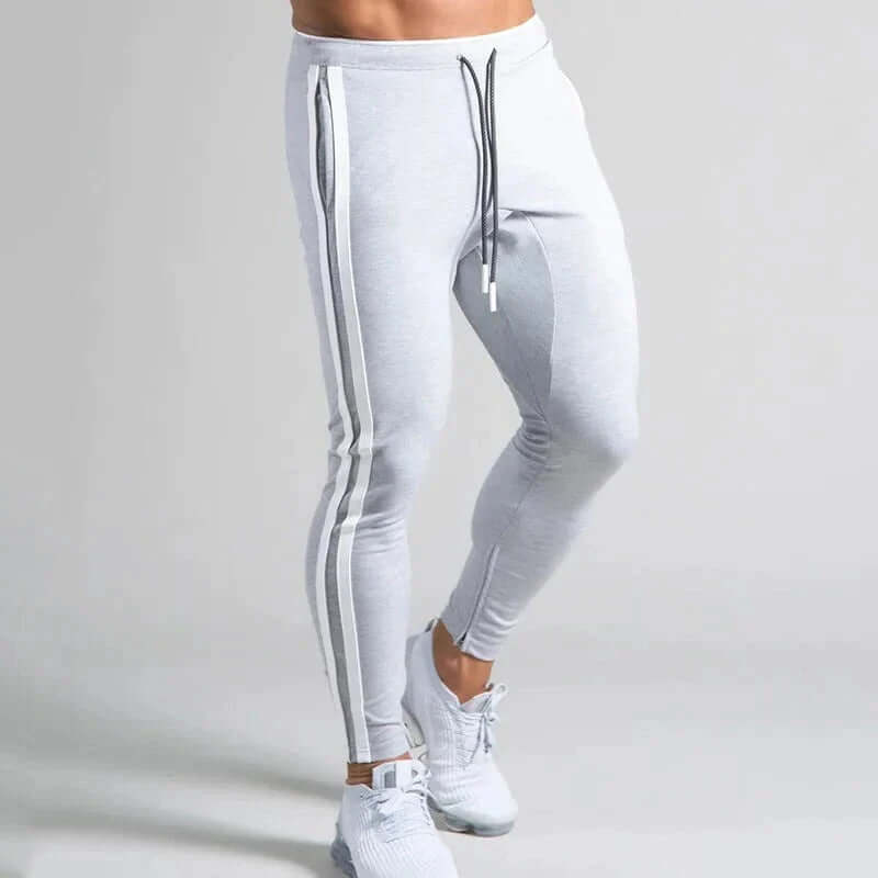 Slim fit men's stripe skinny pants, offering a contemporary stylish look for casual & outdoor wear.
