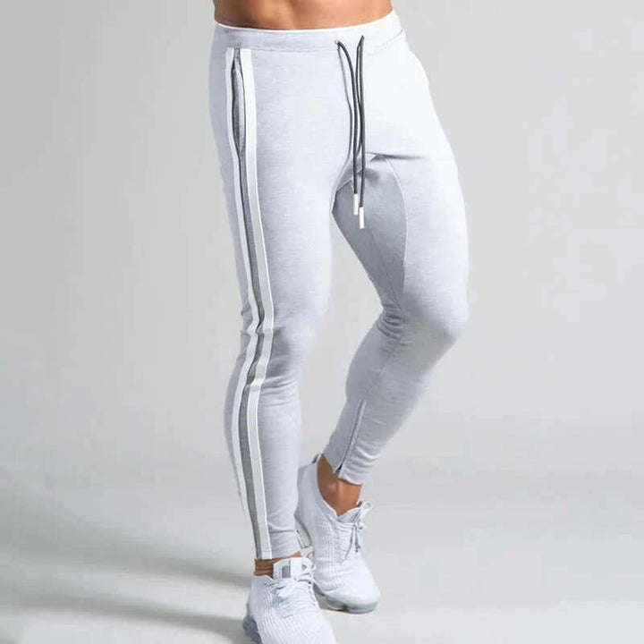 Slim fit men's stripe skinny pants, offering a contemporary stylish look for casual & outdoor wear.