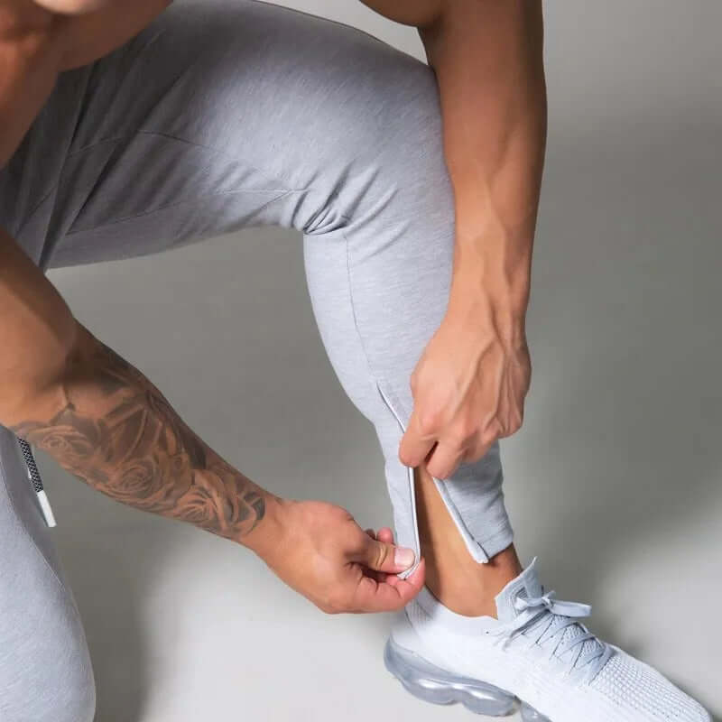 All-season men's stylish stripe skinny pants, essential versatile bottoms for casual & outdoor wear.