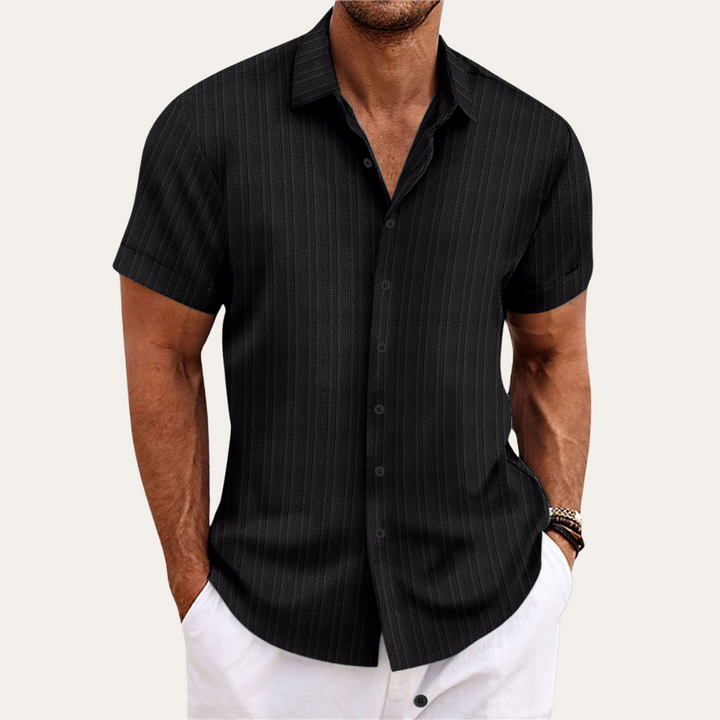Casual men's striped short-sleeve shirt, ideal for summer fashion, beachwear, or smart-casual outings.