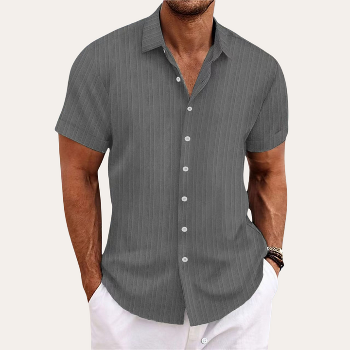Versatile men's striped short-sleeve shirt. Easily transitions from casual to smart-casual or semi-formal.