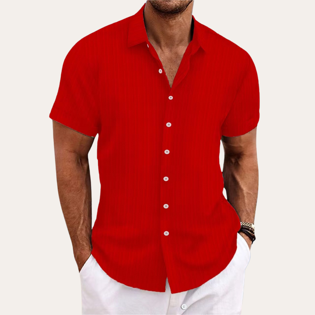 Trendy men's striped short-sleeve shirt for a fresh summer look. Essential for modern men's style.