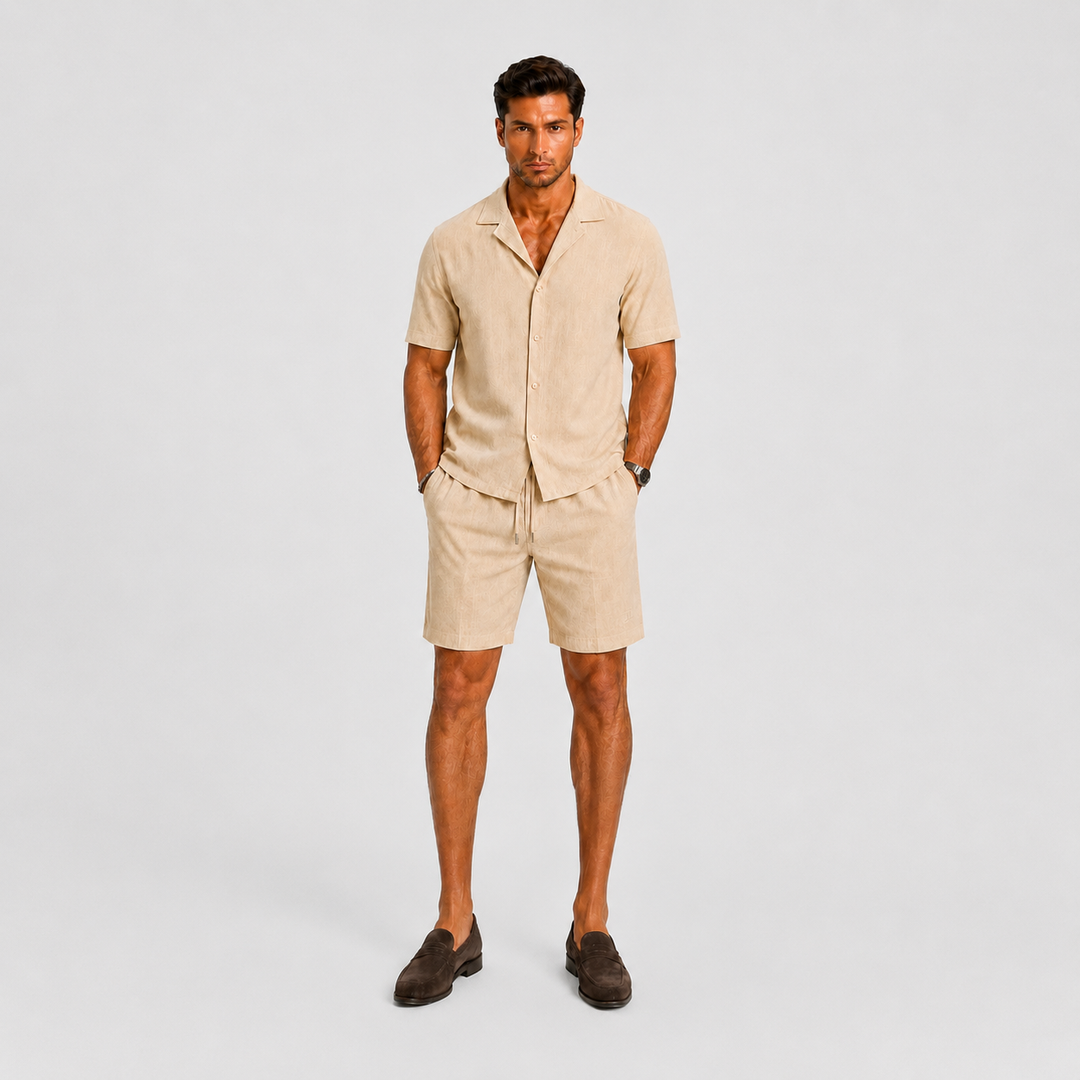 Matching men's summer shorts set, ideal for beach or vacation. Relaxed fit shirt & elastic waist shorts.