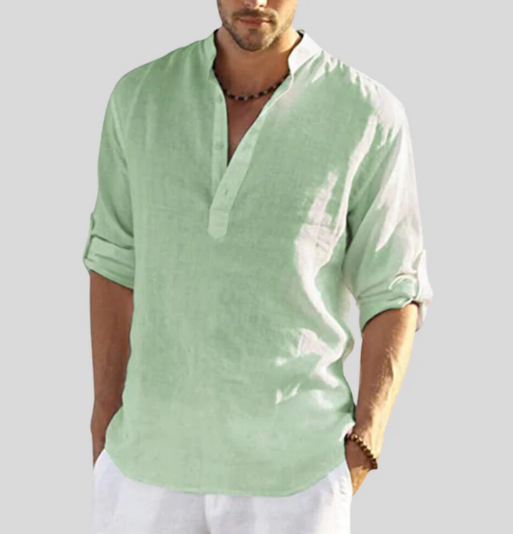 Comfortable men's lightweight summer shirt in light green. Breathable fabric, versatile regular fit.