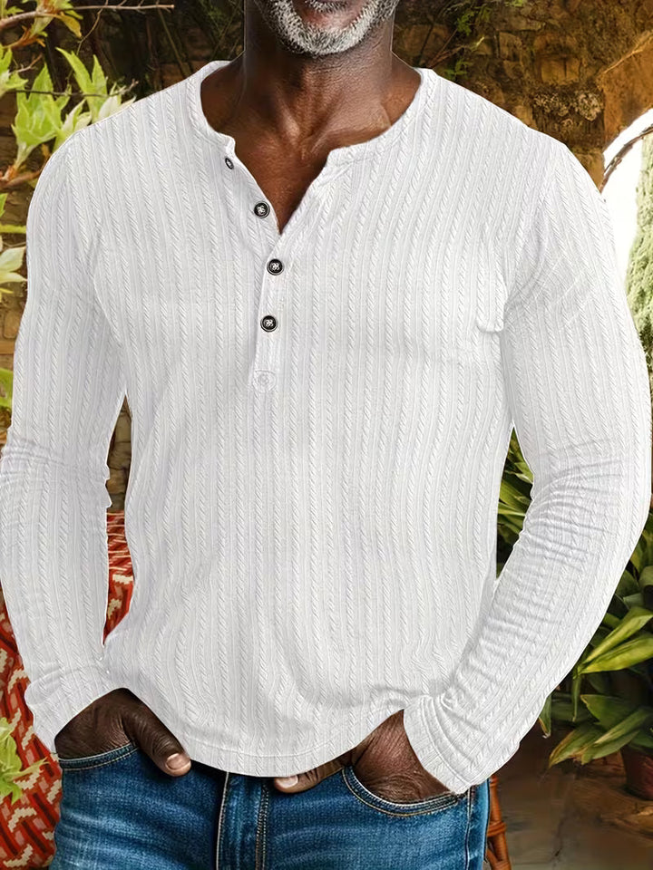 Men's stylish textured long sleeve button-up shirt in a versatile smart casual design, perfect for everyday wear.