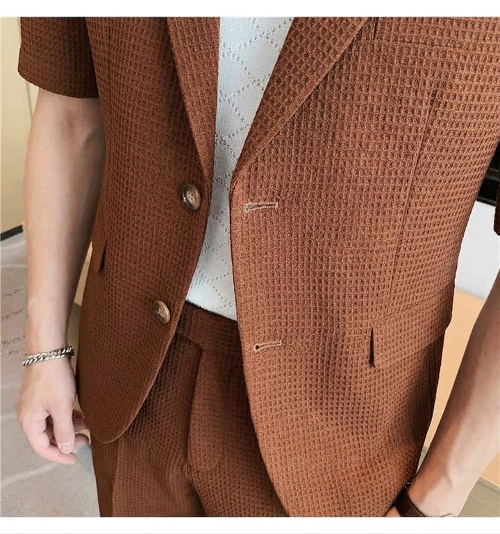 Men's summer suit set featuring a short sleeve blazer & matching shorts. Ideal for casual spring/summer wear.