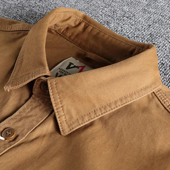 Khaki men's casual utility shirt, comfortable & stylish for versatile everyday fashion.