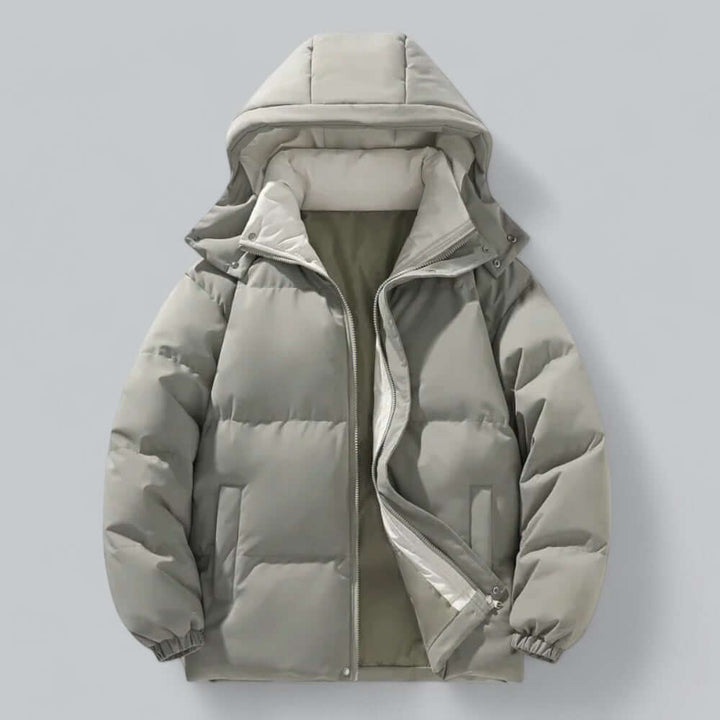 Men's warm winter parka jacket with a detachable hood. Stylish, durable & weatherproof, ideal for cold weather outerwear.