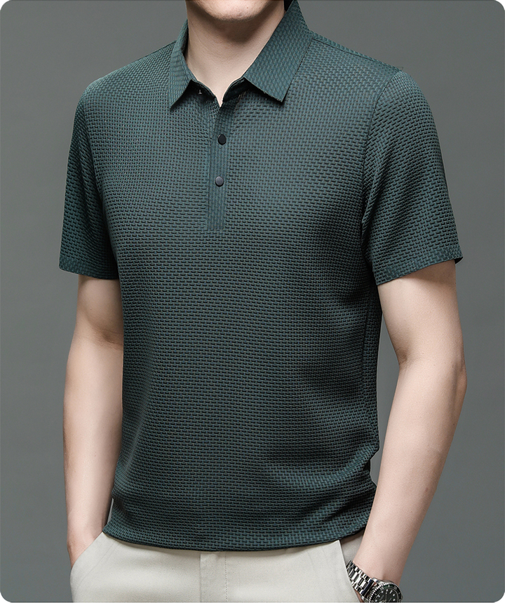 Men's elegant short sleeve button-up polo shirt in beige on a hanger, ready for stylish summer wear.