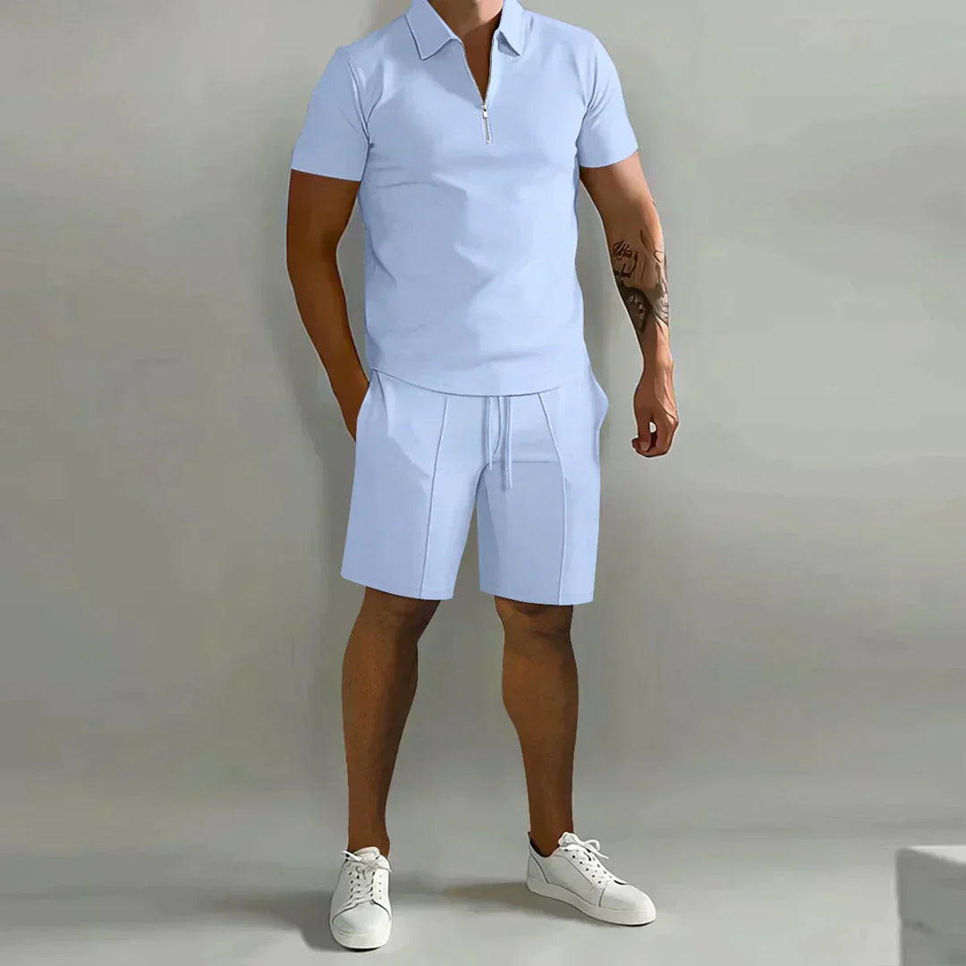 Relaxed fit men's casual set with a stylish zip polo and comfy shorts, ideal for summer fashion and cozy weekends.