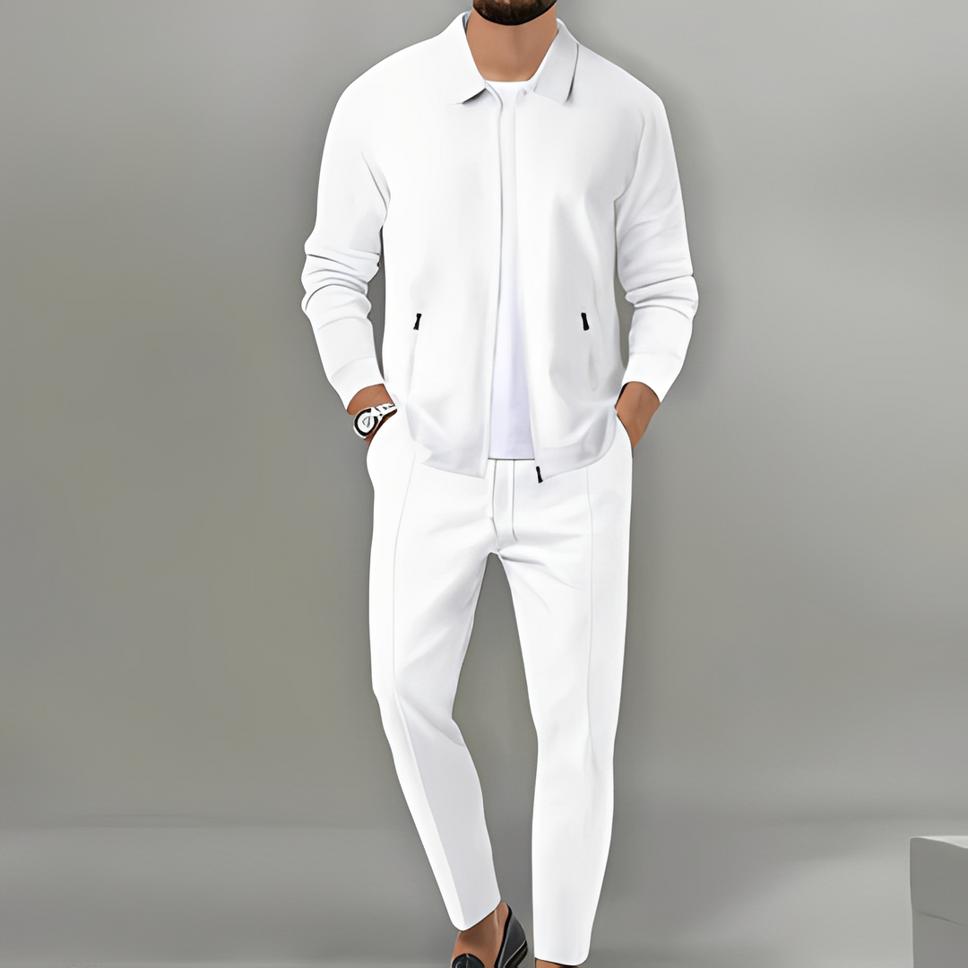 Comfortable men's tracksuit set with soft fabric. Stylish zip-up jacket & pants for lounge or active wear.