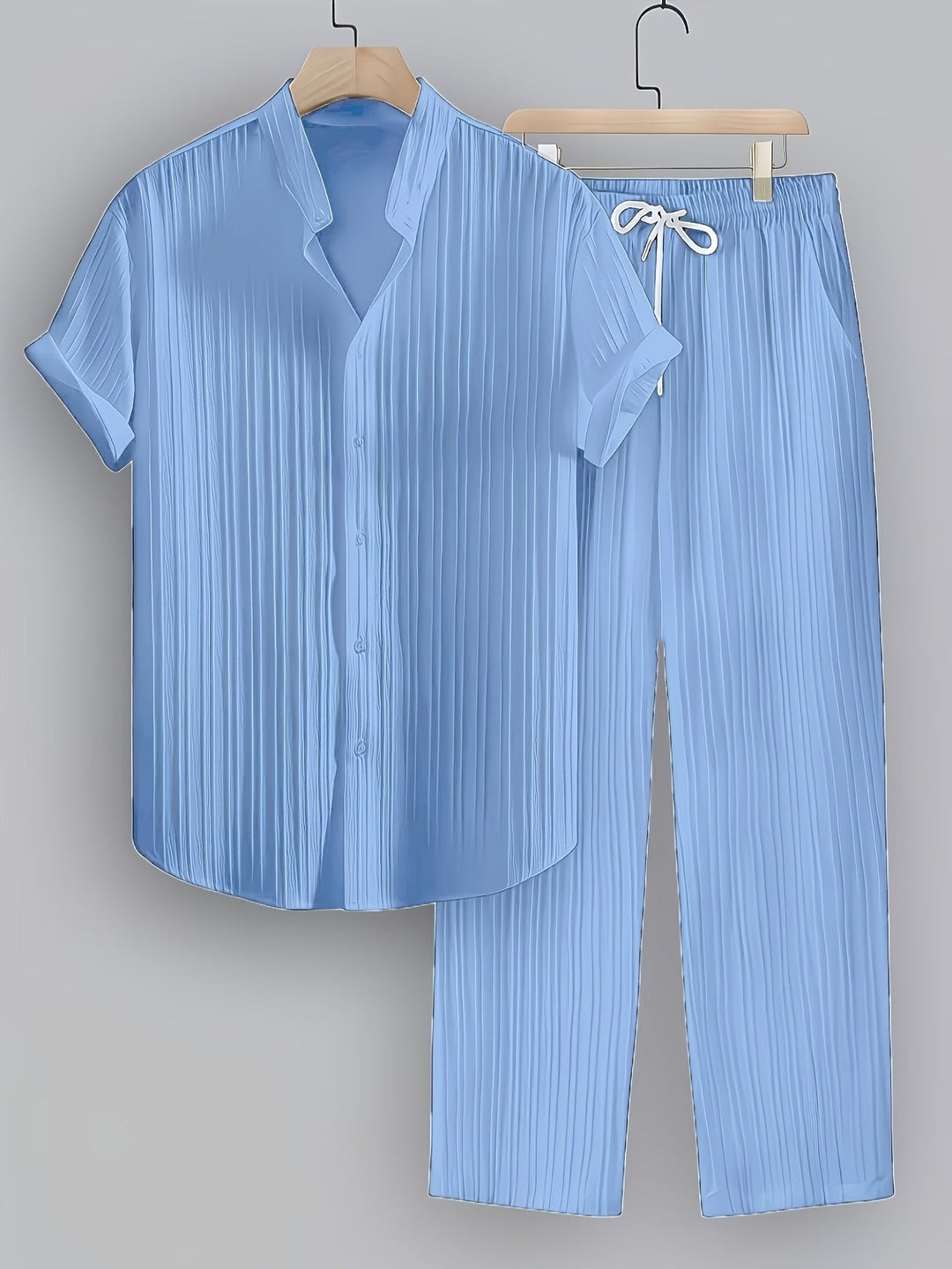 Trendy men's summer casual set. Short-sleeve shirt & stylish drawstring pants for warm weather comfort.