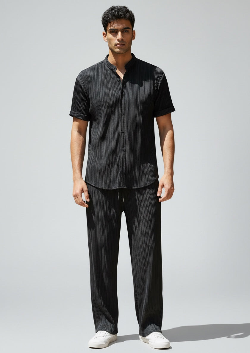 Men's stylish summer casual set. Comfortable short-sleeve shirt and practical drawstring waist pants.