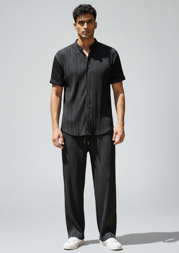 Men's stylish summer casual set. Comfortable short-sleeve shirt and practical drawstring waist pants.