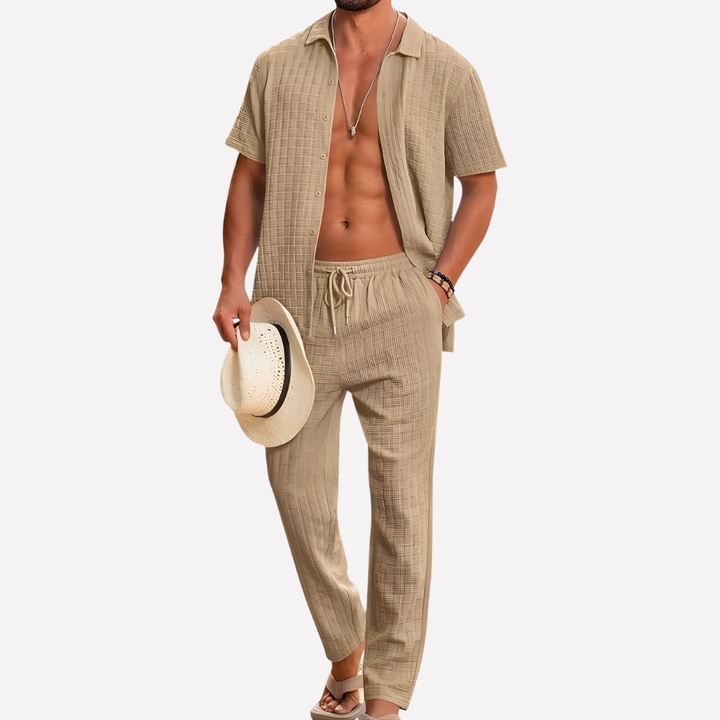 Complete men's summer outfit: textured shirt & relaxed trousers co-ord set for warm weather.