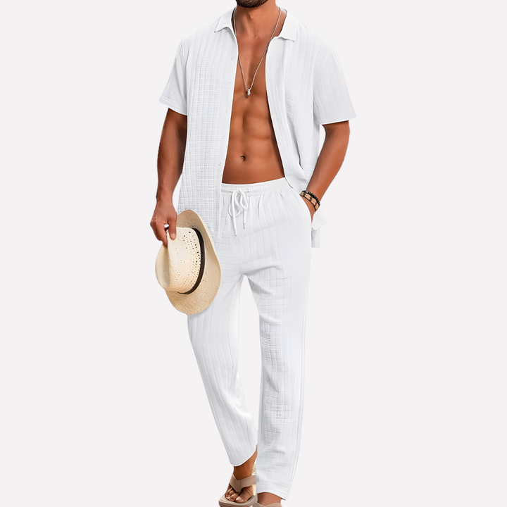Men's summer fashion: textured shirt & relaxed trousers co-ord for a comfortable, stylish two-piece.