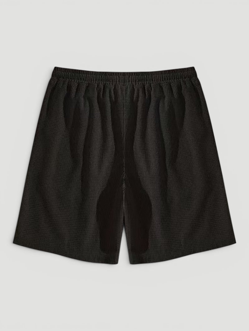 Casual men's textured shorts with an adjustable drawstring. Breathable fabric, ideal for summer fashion.