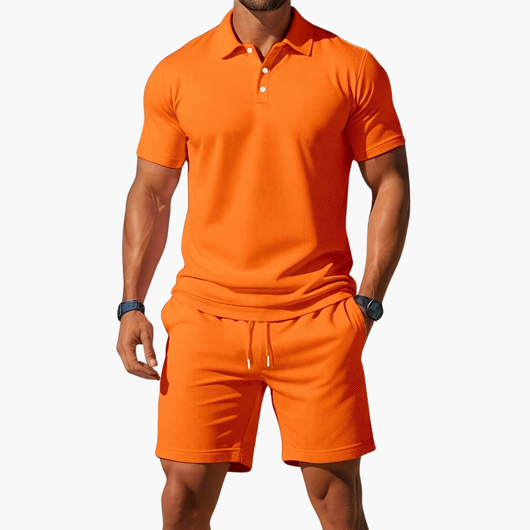 Navy blue men's polo and shorts set. Stylish two-piece summer outfit for vacation and resort wear.