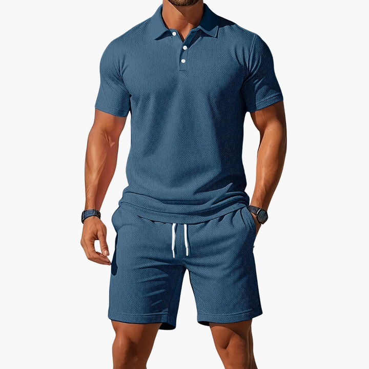 Vibrant orange men's coordinated polo and casual shorts set. Ideal for a summer fashion statement.