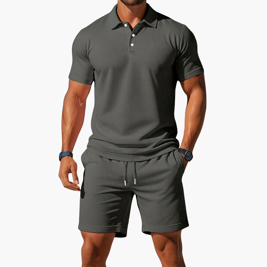 Light grey men's coordinated polo shirt and shorts set. Comfortable summer outfit for men's fashion.