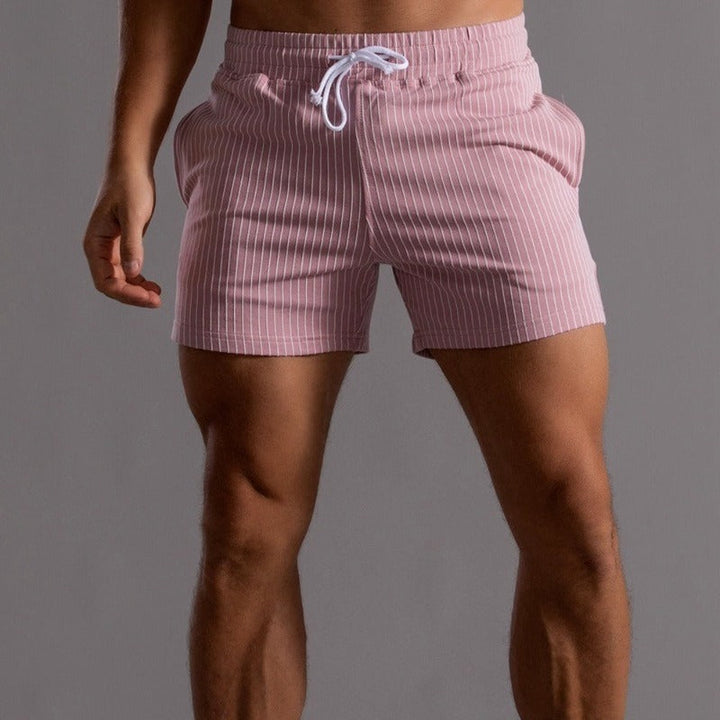 Flexible men's gym shorts, designed for performance & freedom of movement.