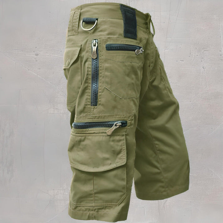 Men's tactical cargo shorts for outdoor adventures. Durable multi-pocket design, perfect for hiking gear.