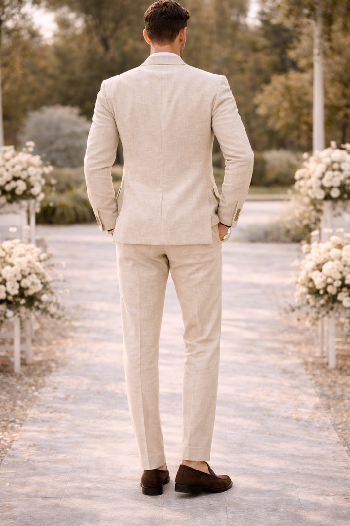 Stylish beige tailored suit for men, ideal wedding outfit or sophisticated formalwear. Modern fit two-piece event suit.