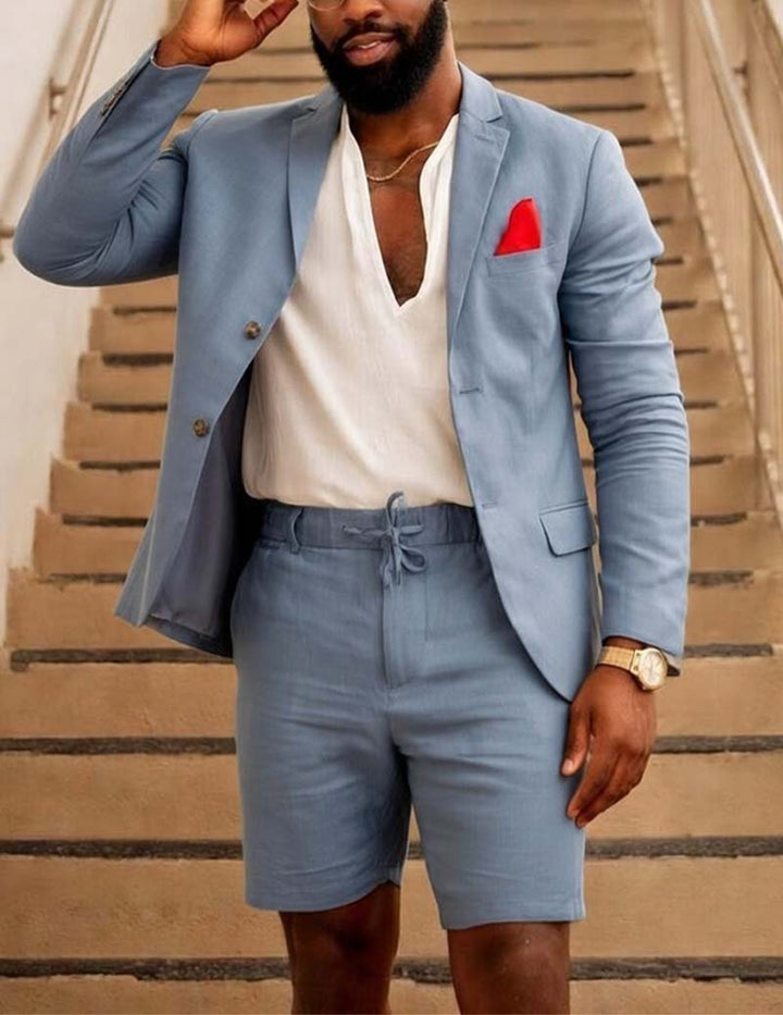 Smart casual men's outfit: tailored blazer and drawstring shorts for a sophisticated yet relaxed summer look.