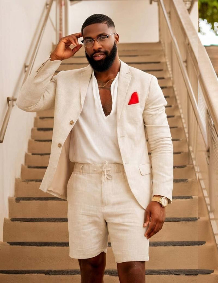 Elegant men's resort wear: a tailored blazer paired with comfortable drawstring shorts for sophisticated style.