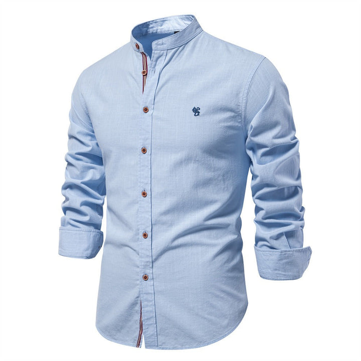 Men's tailored fit short sleeve shirt with a sleek stand collar. Minimalist summer style for men.