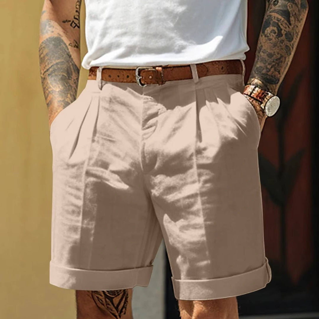 Men's tailored khaki pleated shorts with refined fit & turn up hem, perfect for smart casual summer style.