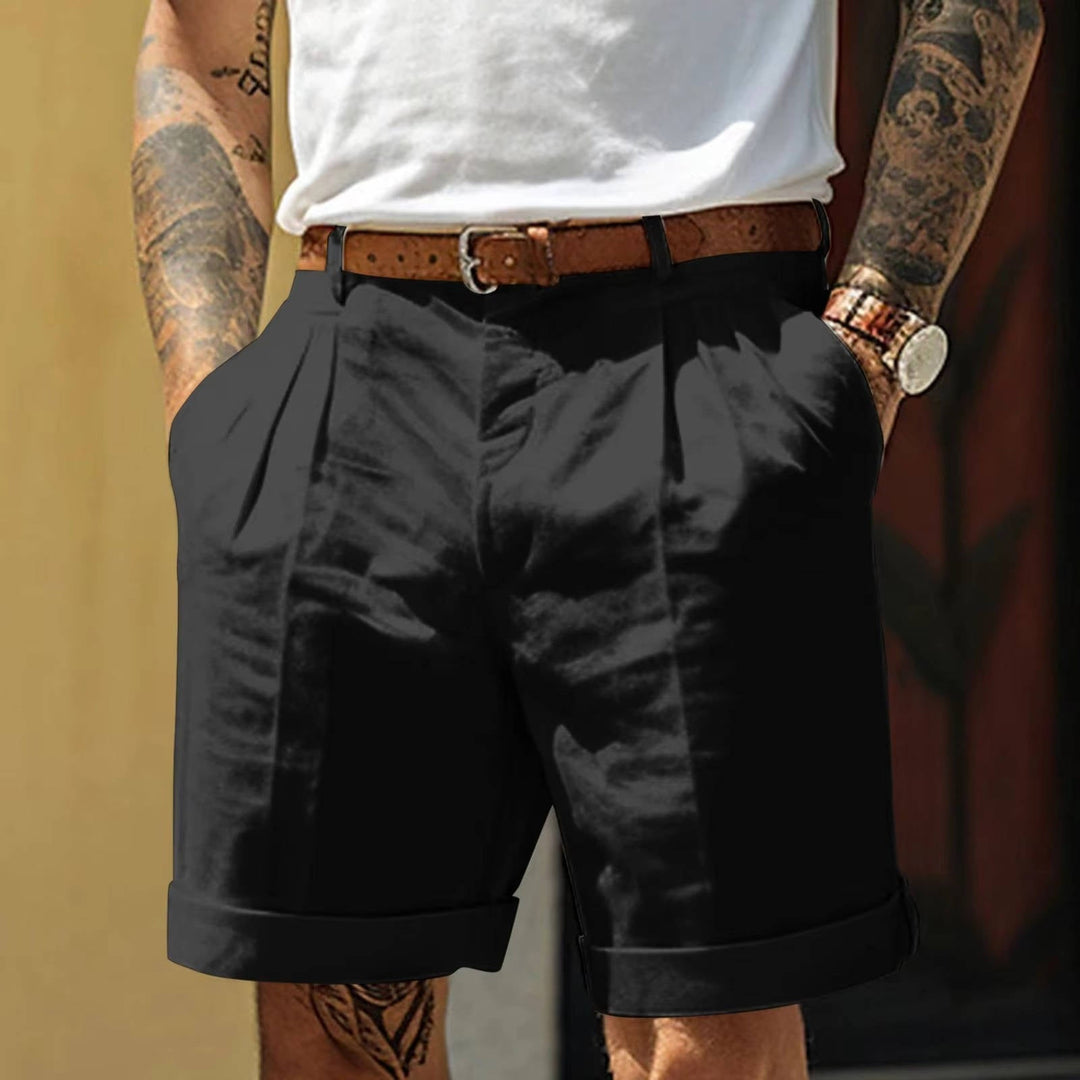 Black tailored men's pleated shorts, refined fit & turn up hem. Versatile smart casual summer wear.