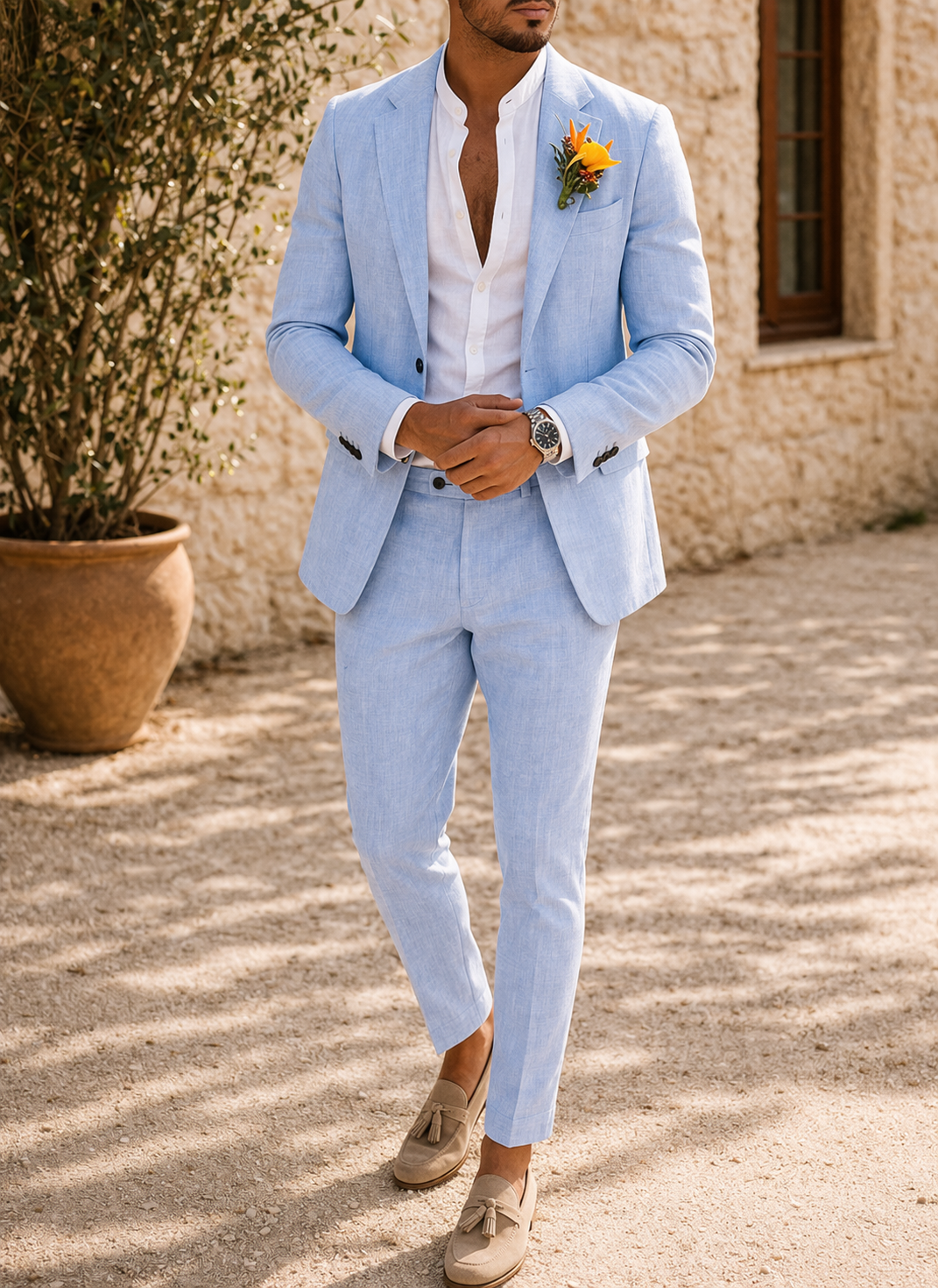 Elegant men's two-piece formal suit featuring a modern blazer & tailored trousers, ideal for wedding attire or parties.