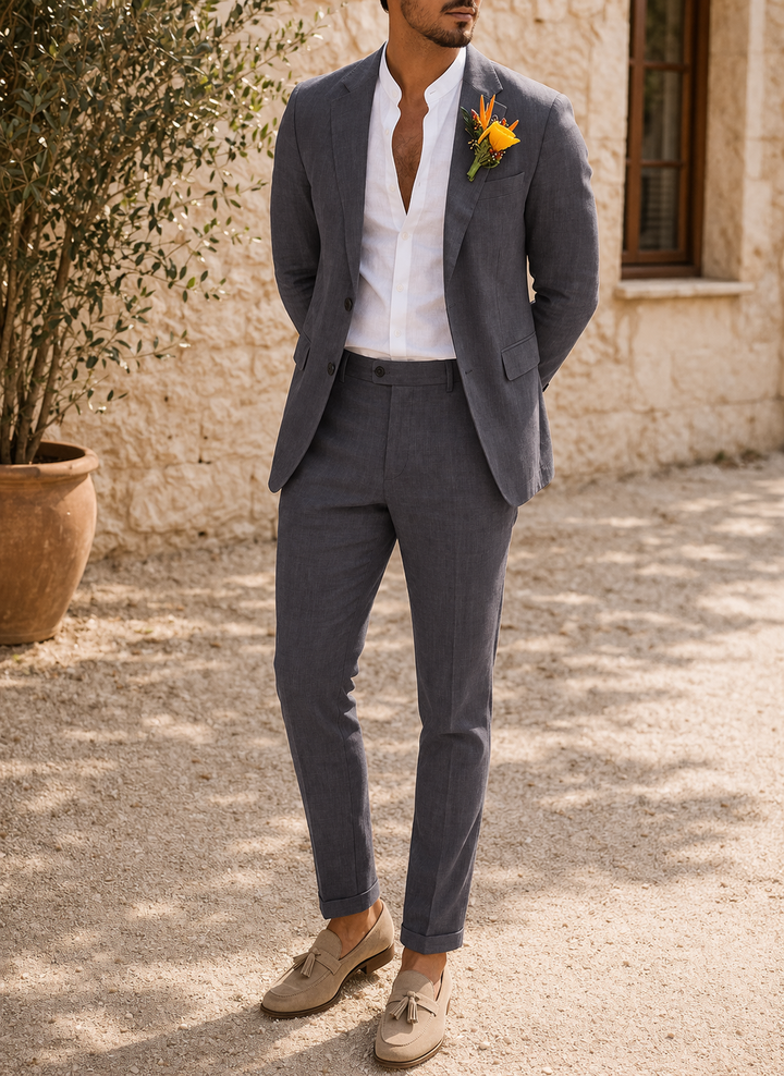 Classic men's tailored two-piece suit with a modern fit blazer and trousers, embodying refined men's fashion.