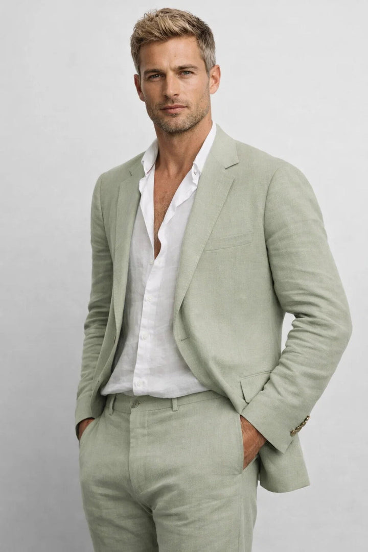 Men's tailored two-piece suit with a modern fit blazer & trousers, ideal for business, formal events & weddings.