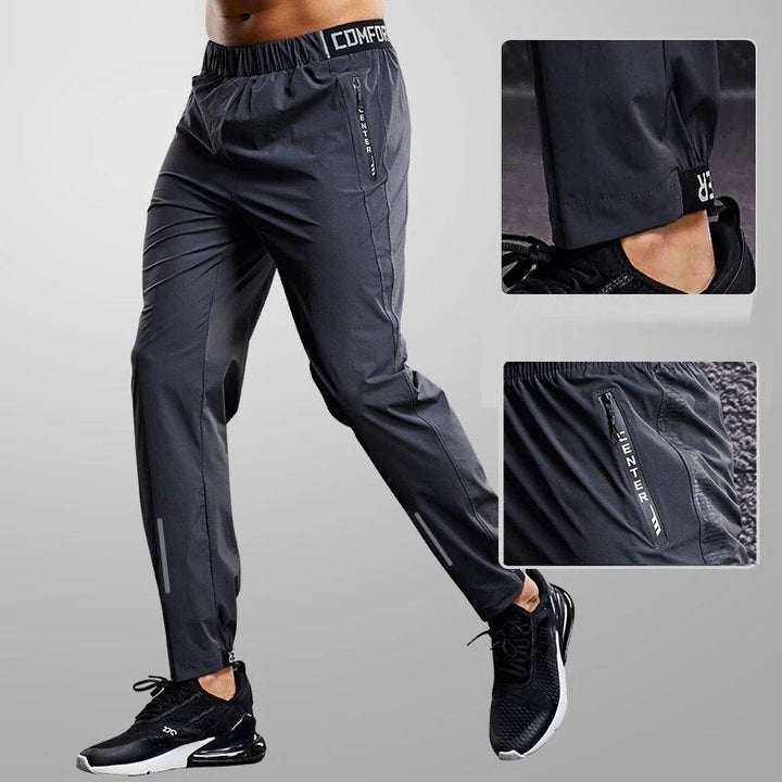 Stylish men's jogger pants with tapered fit & zipper pockets, perfect for workouts, training, or casual fashion.