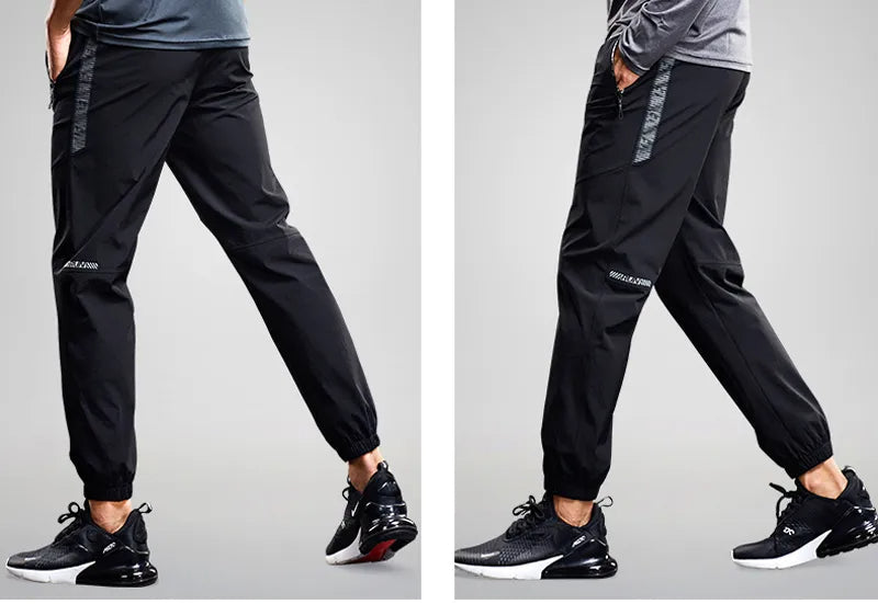 Comfortable men's activewear jogger pants. Tapered fit design with secure zipper pockets for workouts & casual wear.