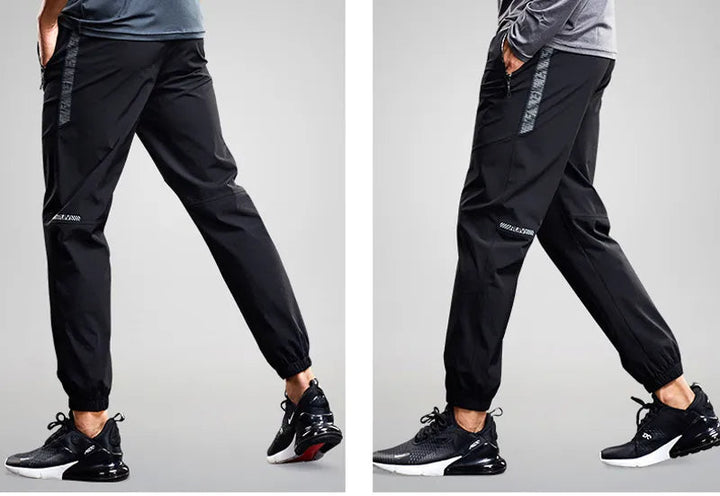 Comfortable men's activewear jogger pants. Tapered fit design with secure zipper pockets for workouts & casual wear.