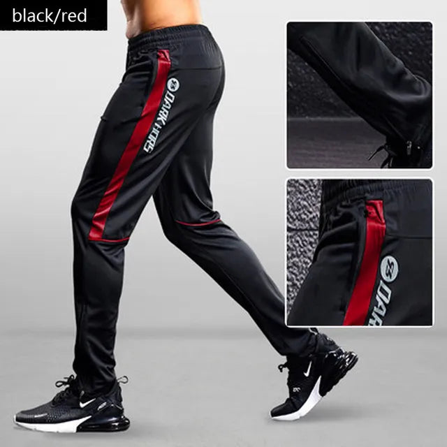 Versatile men's gym pants, tapered design with functional zipper pockets for comfort during training sessions.