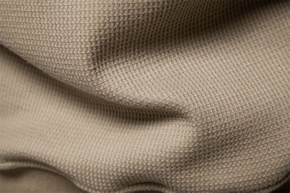Smart men's henley sweatshirt with a textured finish, ideal for everyday fashion.