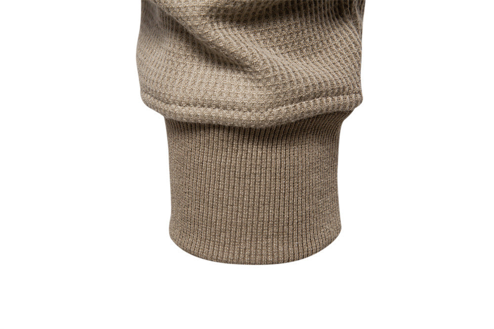 Men's comfort-fit textured henley sweatshirt, a versatile long sleeve top for casual outfits.