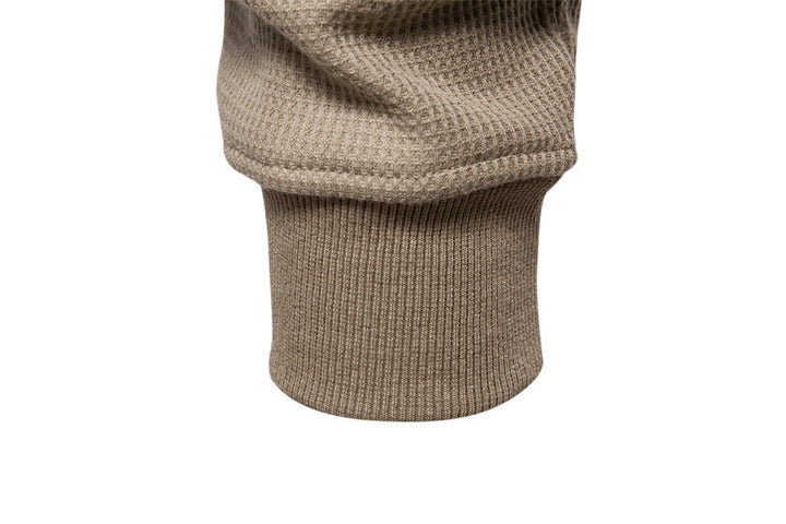 Men's comfort-fit textured henley sweatshirt, a versatile long sleeve top for casual outfits.