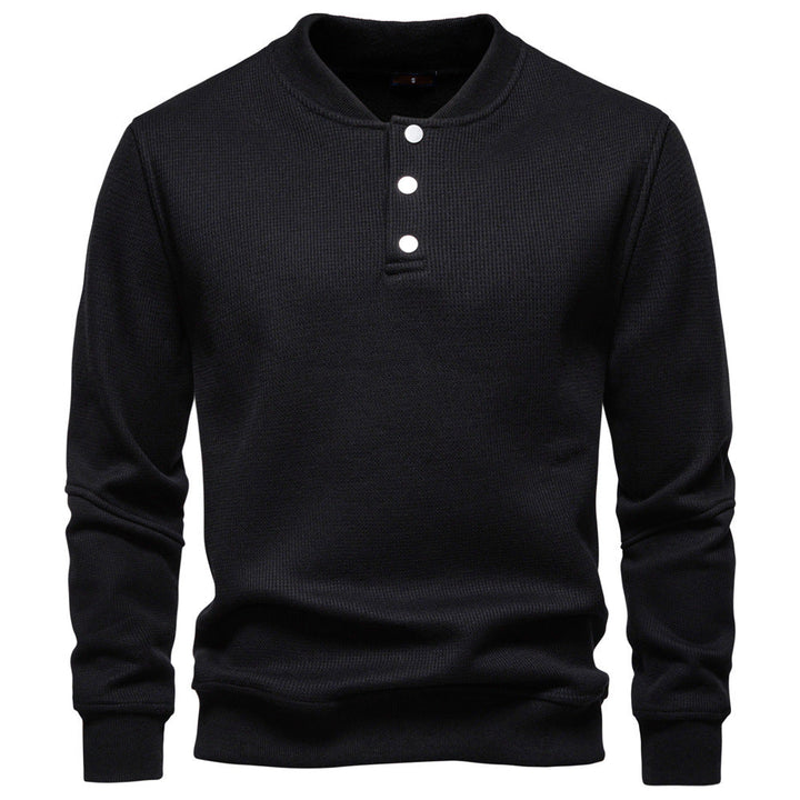 Fashionable men's textured henley sweatshirt, perfect for cool weather layering.