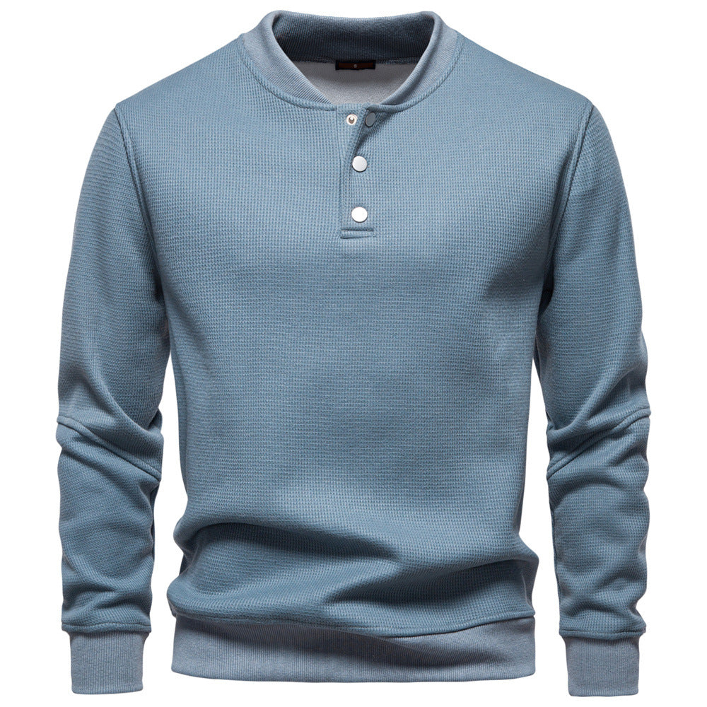 Cozy men's textured henley top, a comfortable long sleeve sweatshirt for versatile style.