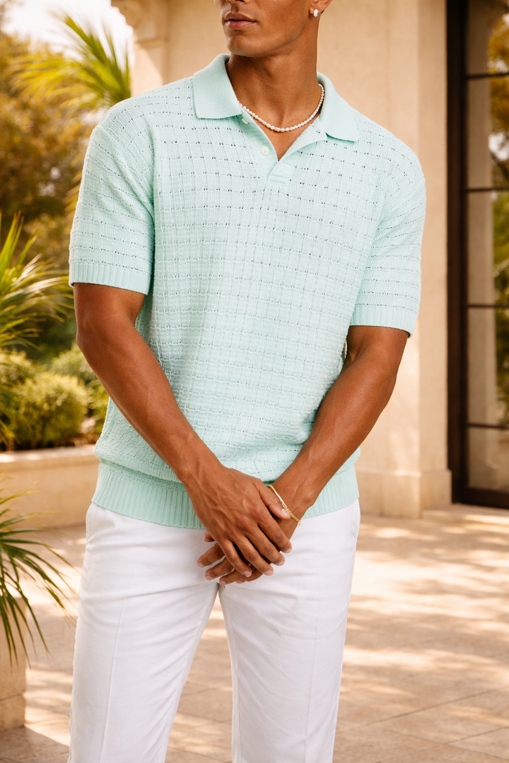 Stylish men's textured polo with a modern open collar, offering a relaxed and comfortable summer look.