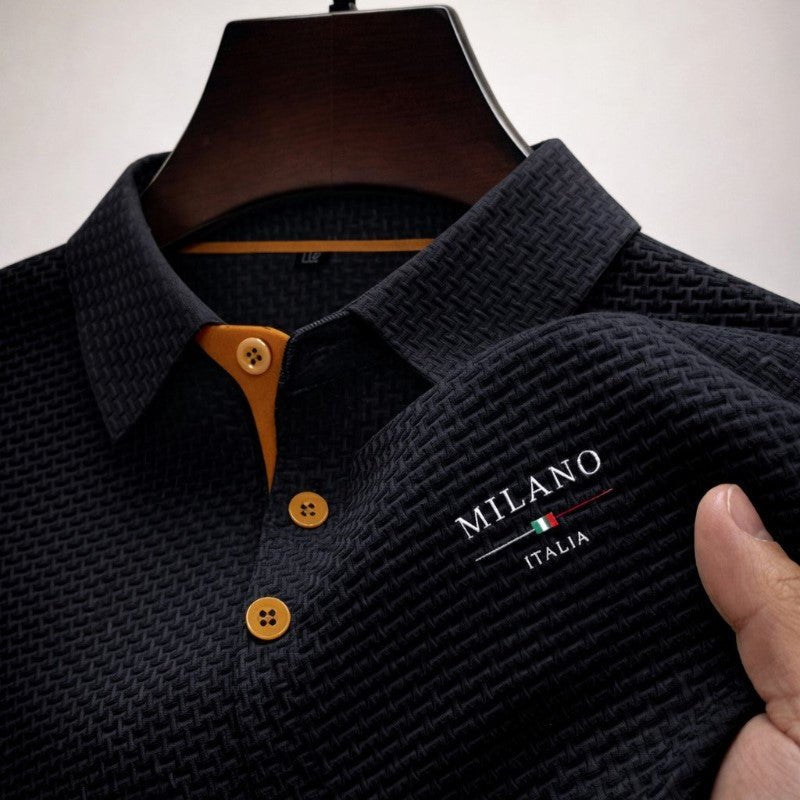 Men's textured polo shirt in smart-casual style, featuring embroidered detail and a structured collar for modern fashion.