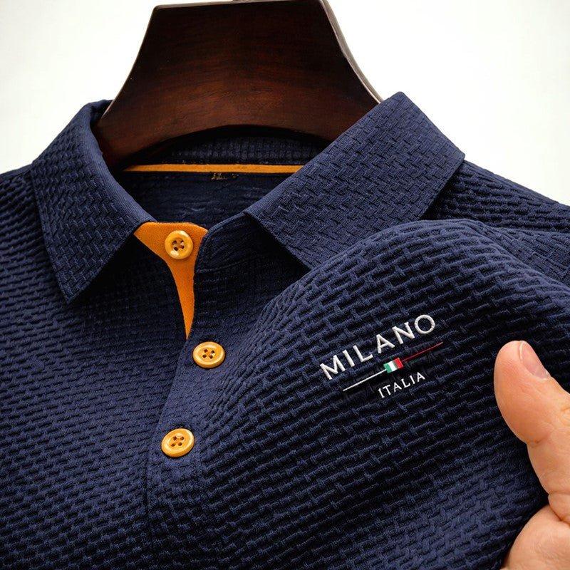 Stylish men's textured knit polo shirt with intricate embroidered detail, offering a modern and refined smart-casual look.